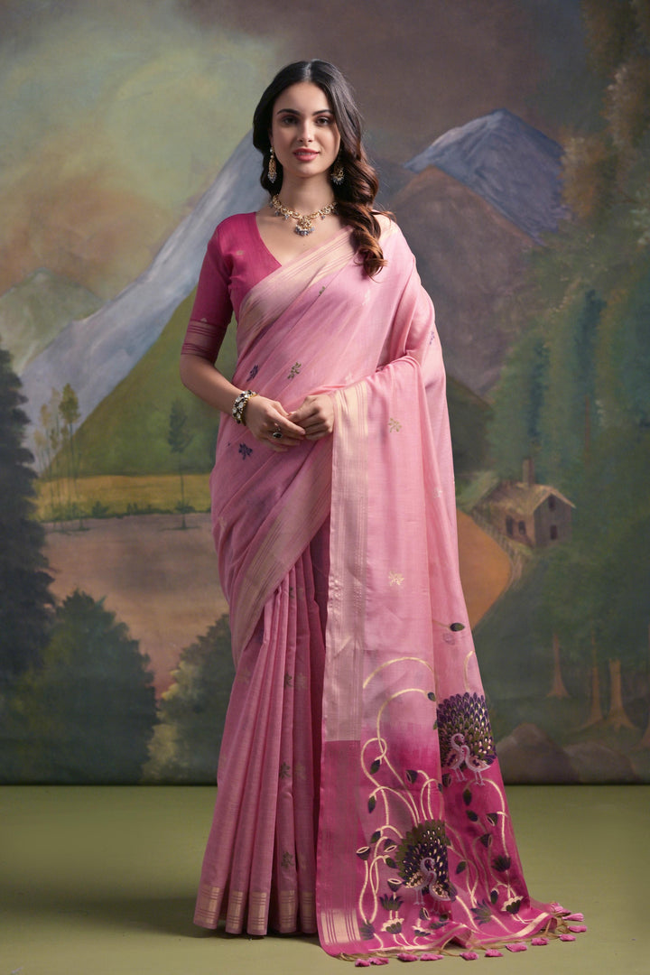 Elegant peach Muga silk saree, featuring delicate Resham work for festive celebrations.