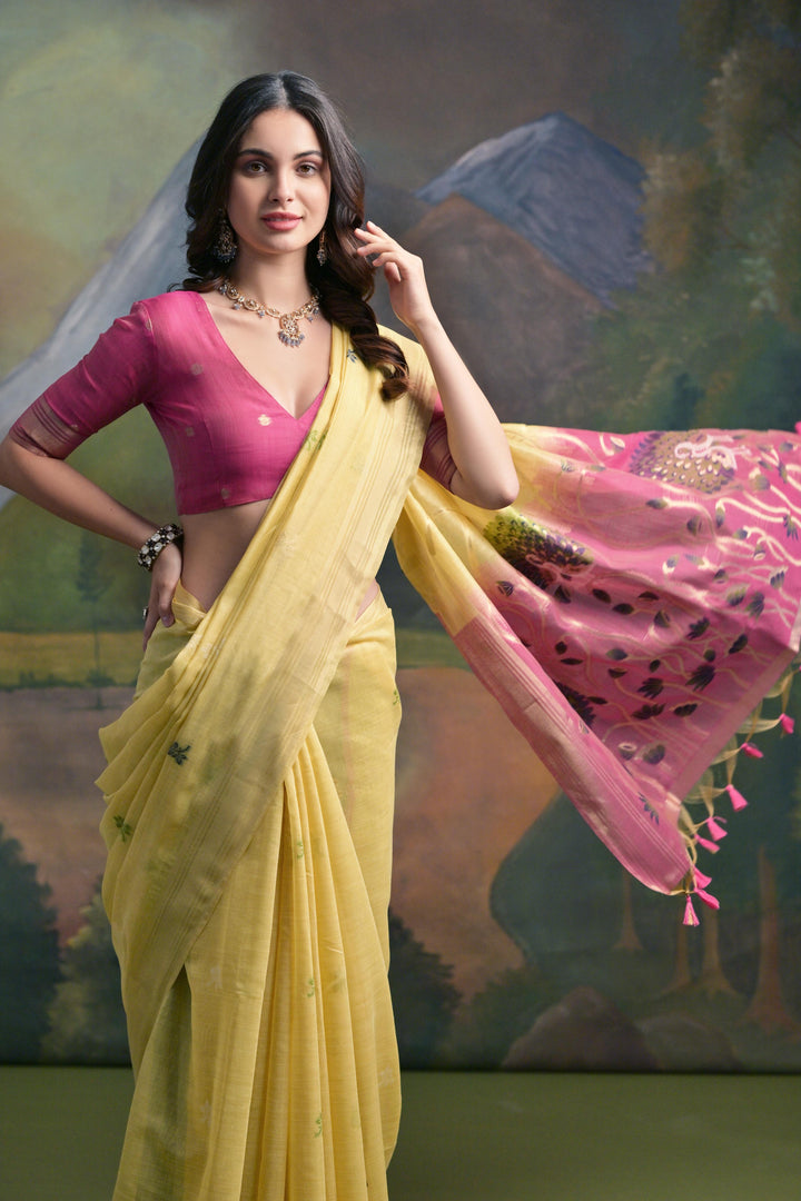 Classic and elegant USA Muga silk saree, resham butties, zari woven border, and fancy tassels for festive events