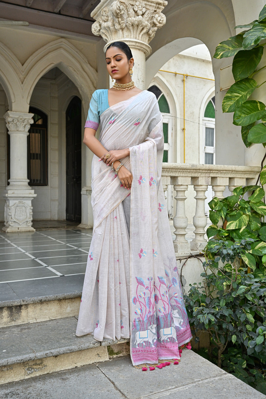 Muga silk saree with floral design and classic tassels for weddings