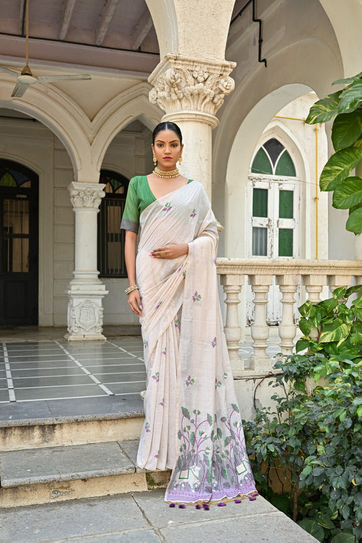 Wedding-ready Muga silk saree with floral weaving and tassel details