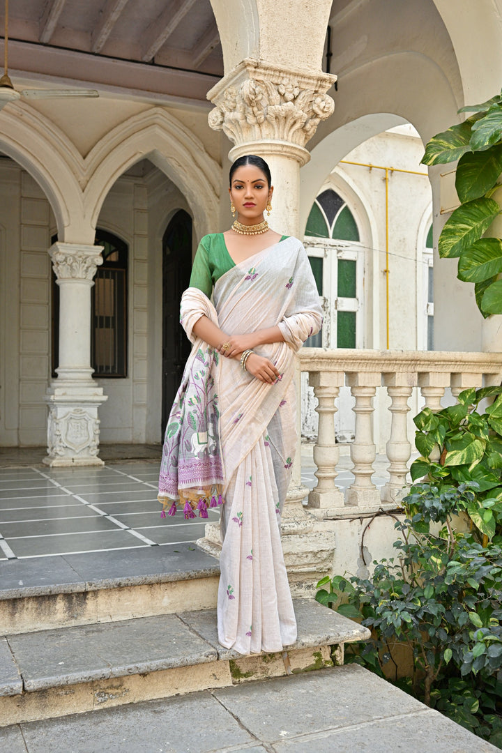 Classic Muga silk saree with contrast blouse and floral pattern