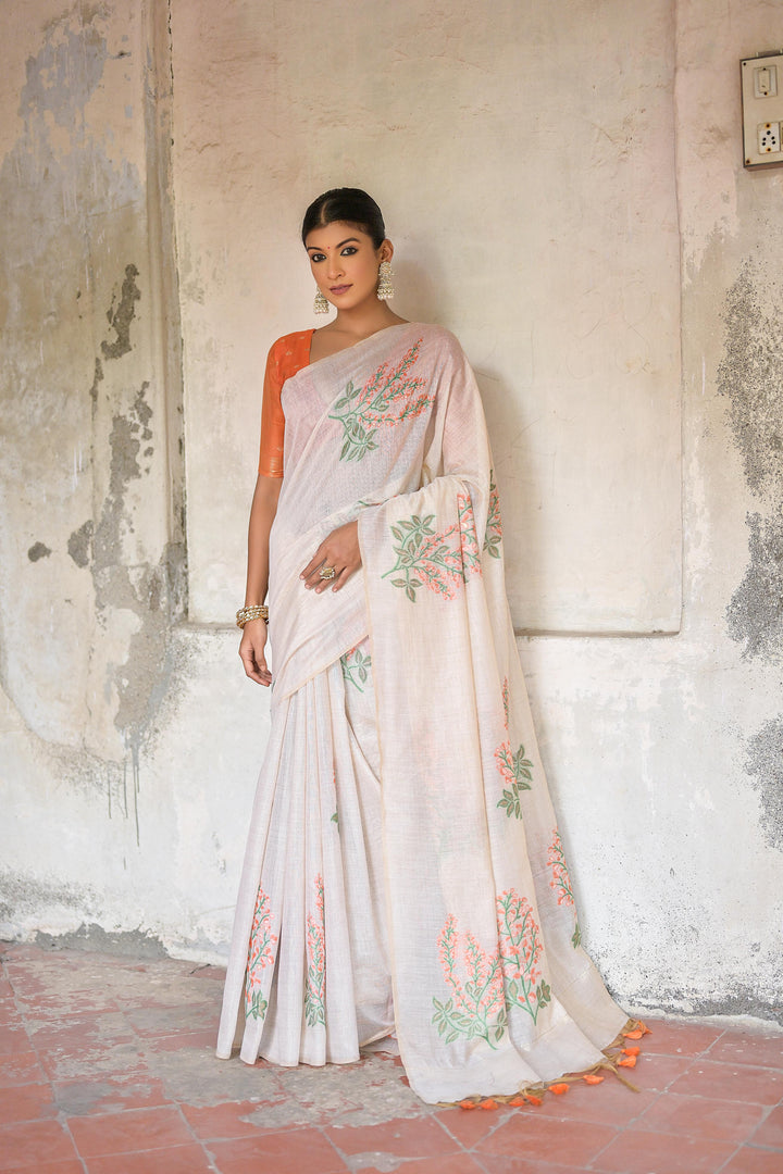 5.5 MTR Muga cotton saree with floral weaving and small zari border for elegance