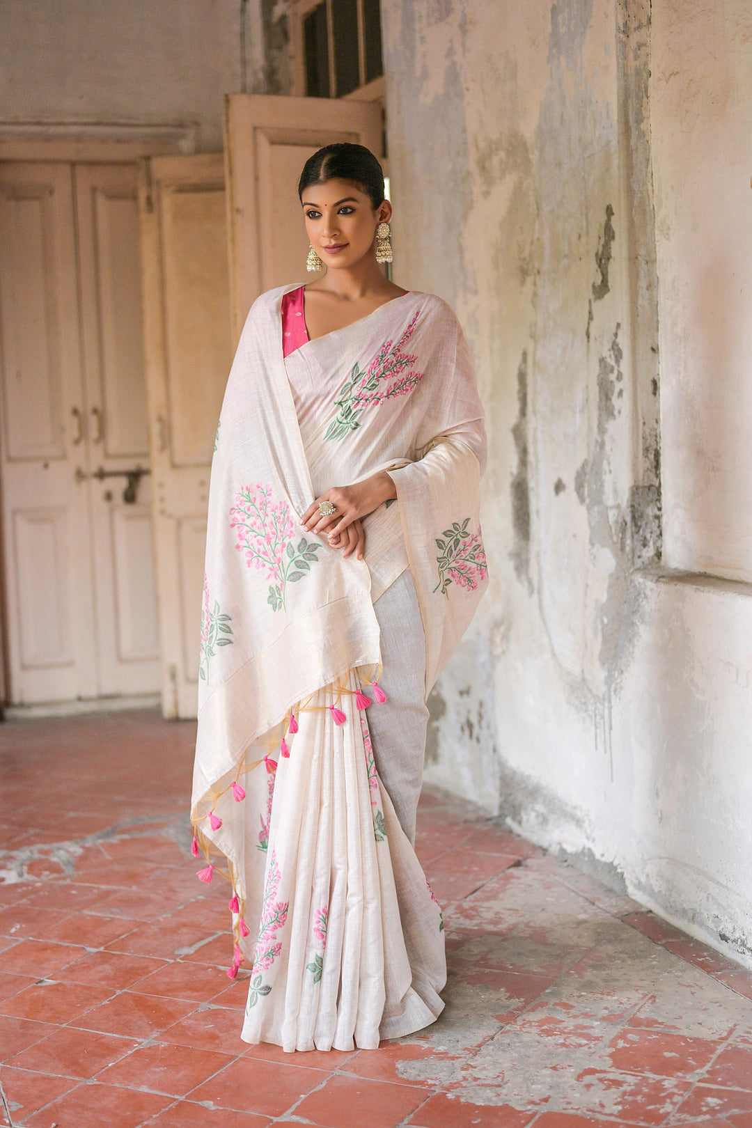 Premium soft Muga saree with floral weaving, classic tassels, and contrast blouse