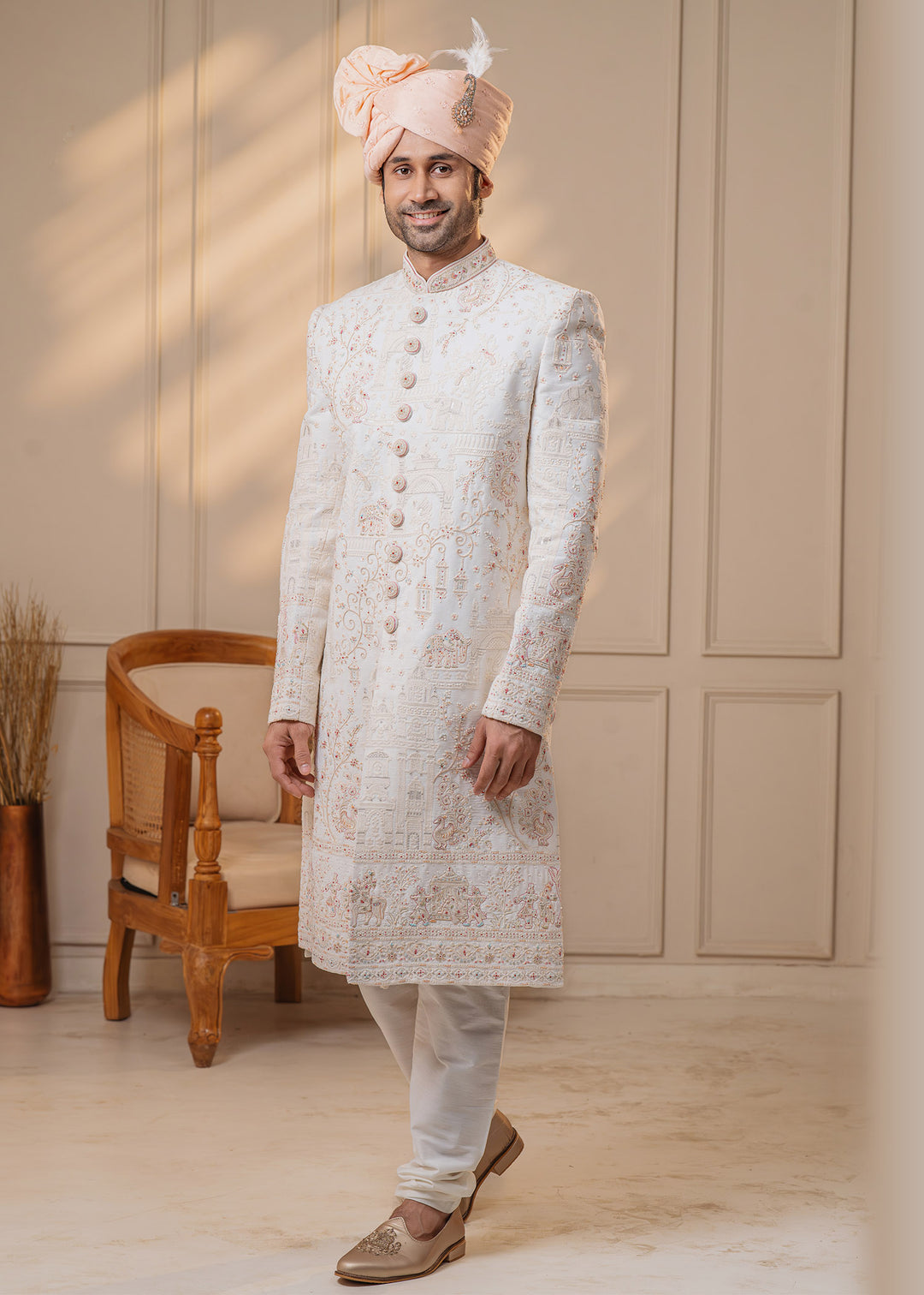 Elevate your wedding wardrobe with this ivory sherwani, combining elegance and modern design.