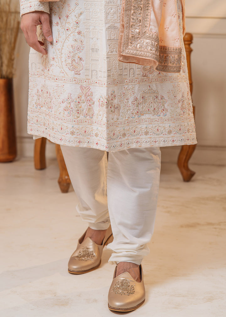 Shop this designer ivory sherwani set, perfect for turning heads at weddings in the USA.