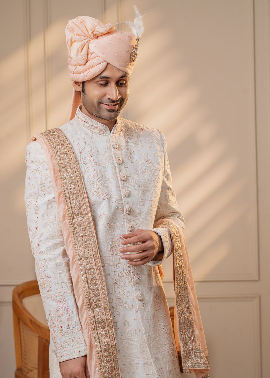 This unique asymmetrical sherwani set offers a stylish look for grooms at Indian weddings.