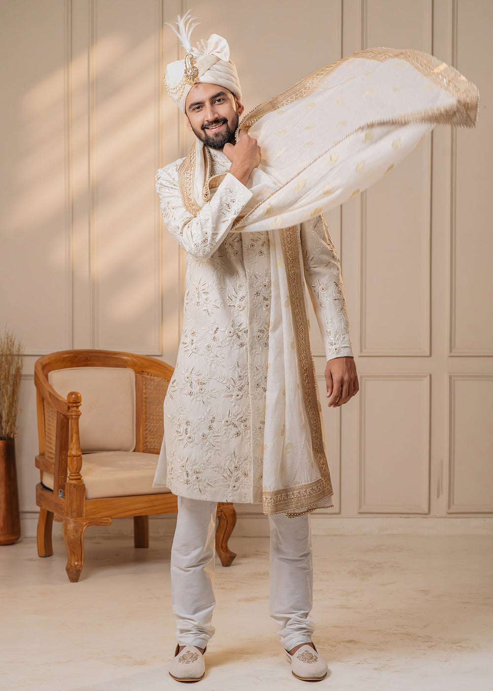 Make a statement with our ivory sherwani set, ideal for grooms who appreciate exquisite craftsmanship and elegant design for their special day.