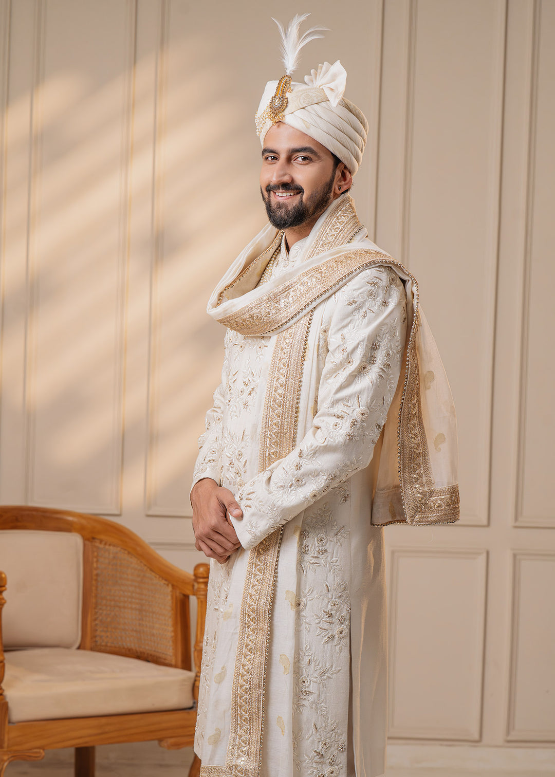 Embrace tradition with our ivory sherwani set, featuring stunning embroidery and zardosi accents, perfect for creating unforgettable wedding memories.