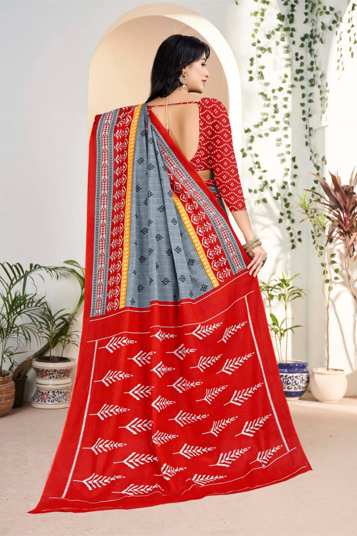 Beautiful grey and red handloom cotton saree with unique tribal motifs, ideal for festive occasions.