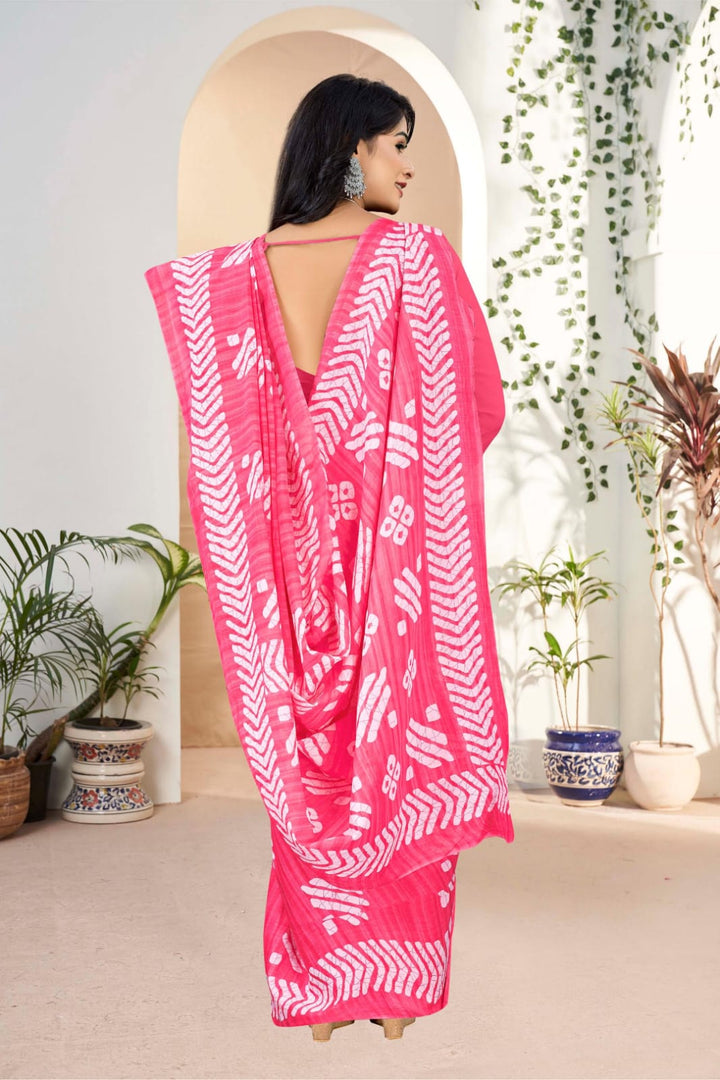 Stylish pink cotton saree with handloom craftsmanship and tribal patterns, perfect for parties.