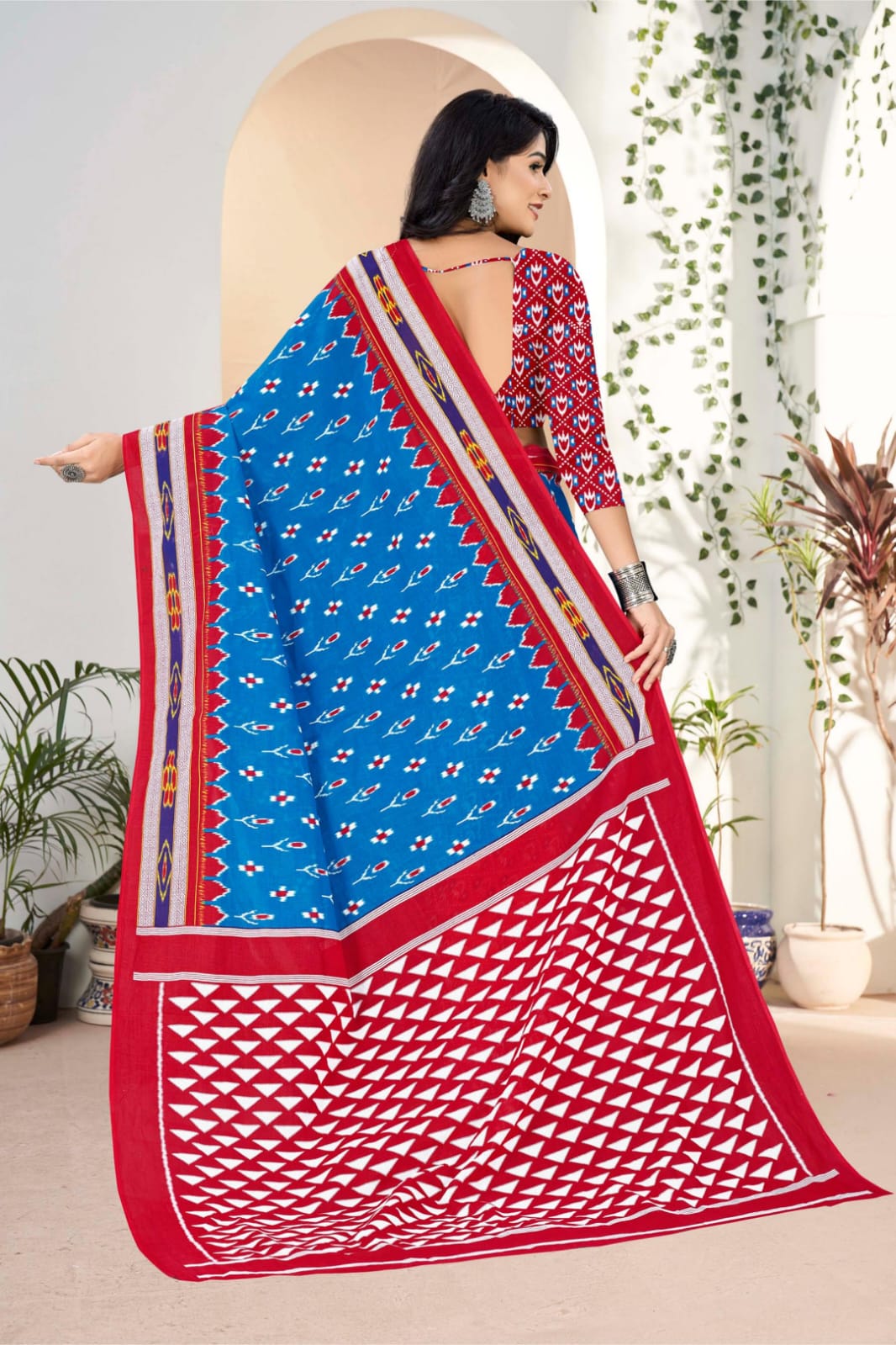 Stunning blue and red Indian saree with handloom cotton texture and tribal patterns, perfect for heritage events.