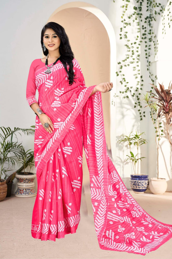 Elegant pink handloom cotton saree with beautiful tribal motifs, perfect for cultural occasions.