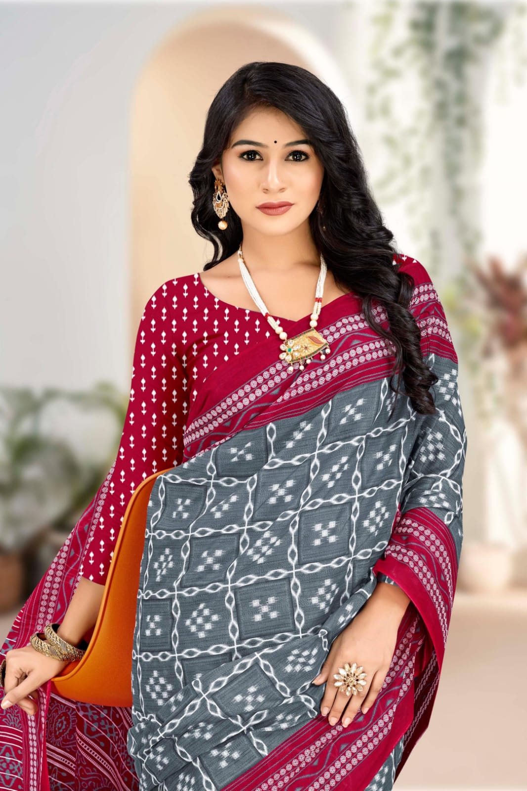 Elegant gray and burgundy handloom cotton saree with unique tribal motifs, ideal for traditional events.