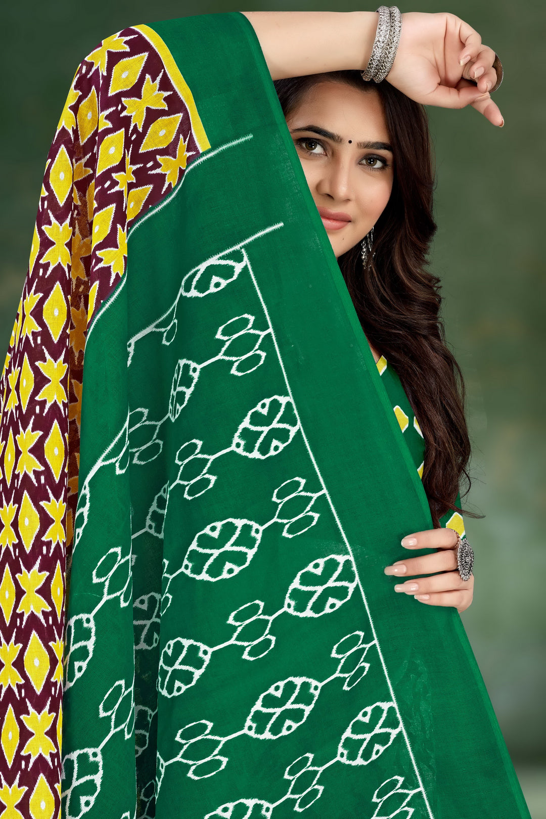 Beautiful green cotton saree with handloom craftsmanship, perfect for Indian festivals and weddings.