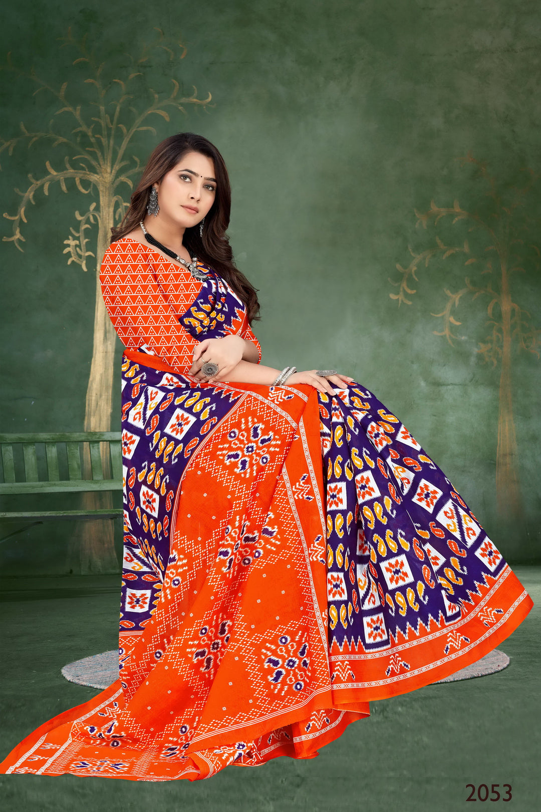 Bold and beautiful orange and blue handloom cotton saree with stunning tribal motifs for cultural events.