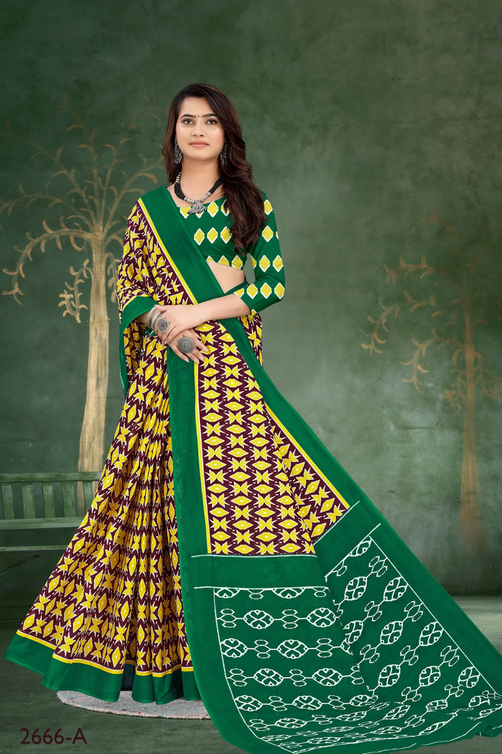 Stunning green handloom cotton saree, perfect for festive occasions with intricate tribal motifs.