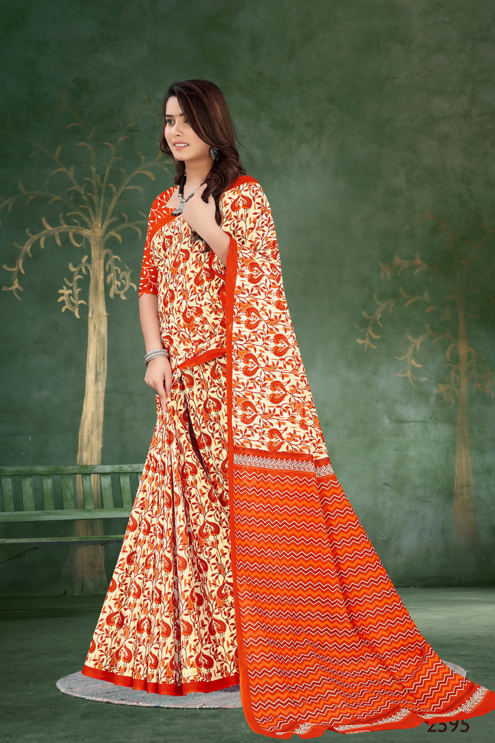 Bright and festive orange handloom cotton saree, perfect for weddings and family gatherings.