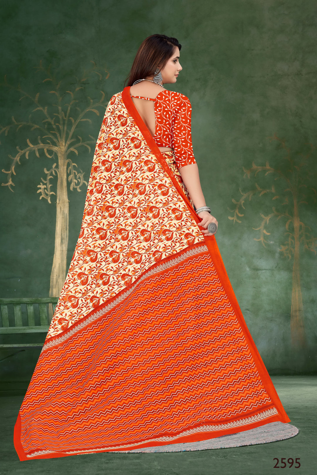 Elegant orange handloom saree with traditional motifs, ideal for cultural and celebratory occasions.