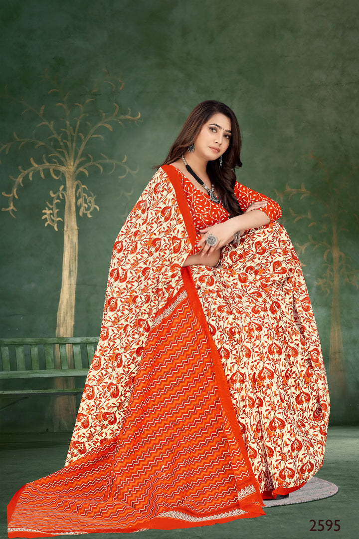 Traditional orange handloom cotton saree with elegant patterns, designed for special occasions.