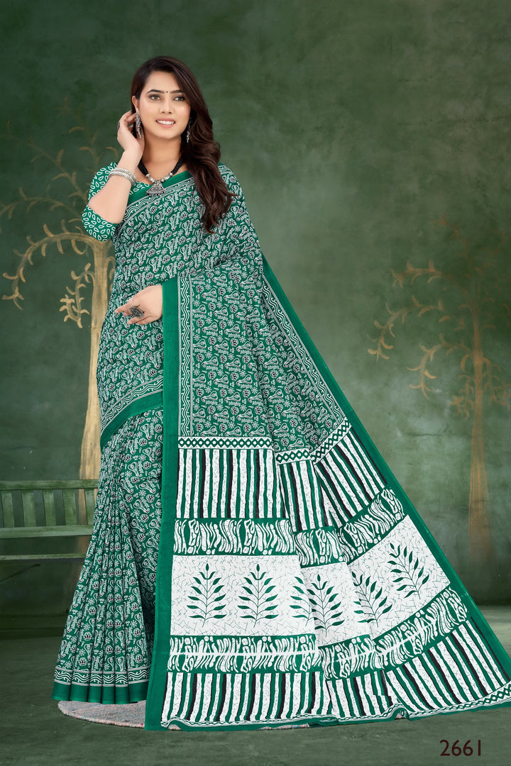 Beautiful green handloom cotton saree with tribal motifs, perfect for festive occasions and celebrations.