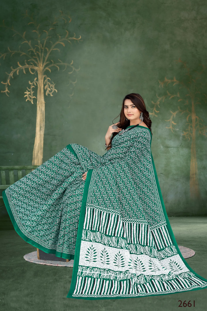 Stunning green saree with handloom cotton craftsmanship and tribal motifs, ideal for Indian festivals.