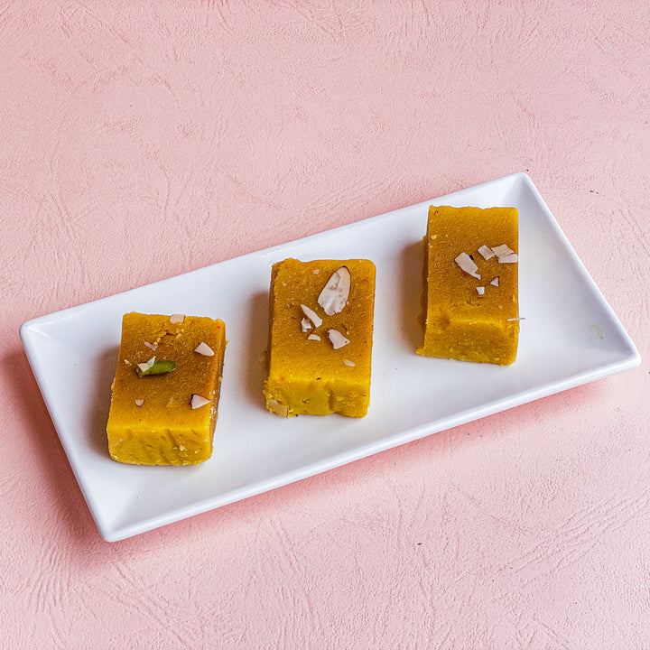 Ghee Mysore Pak A creamy South Indian sweet made with pure ghee, perfect for festive occasions and special celebrations.