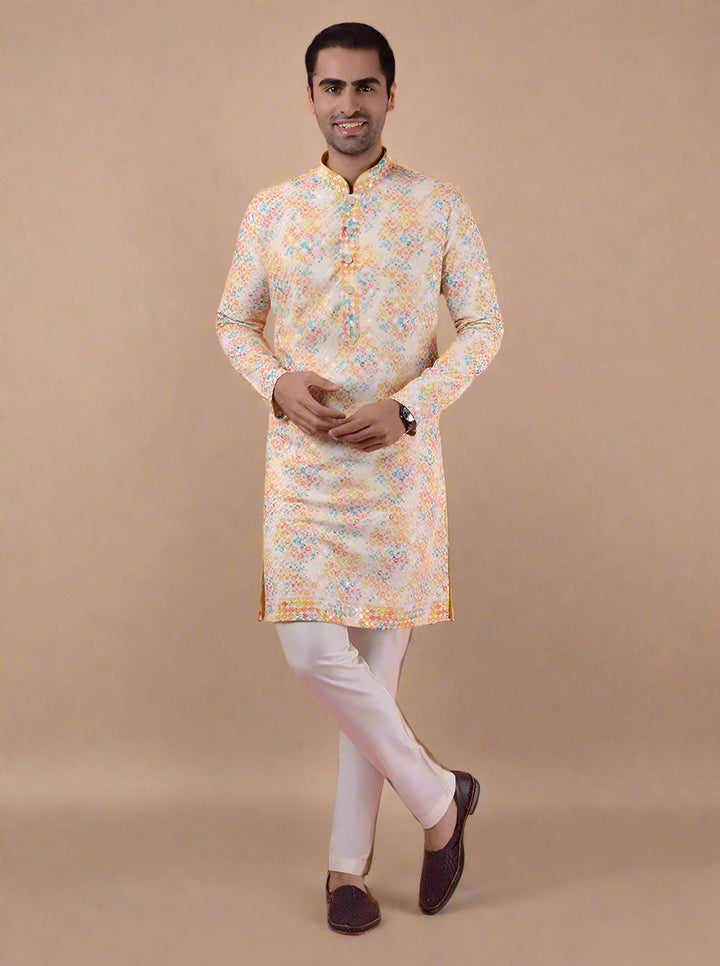 Elegant men's yellow kurta pajama, crafted from luxurious silk blend for festive wear.