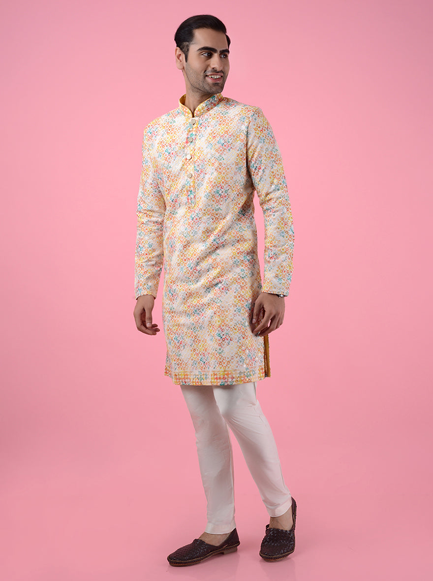 Celebrate in style with this Yellow and Orange Silk Blend Kurta, crafted for vibrant events across the USA.