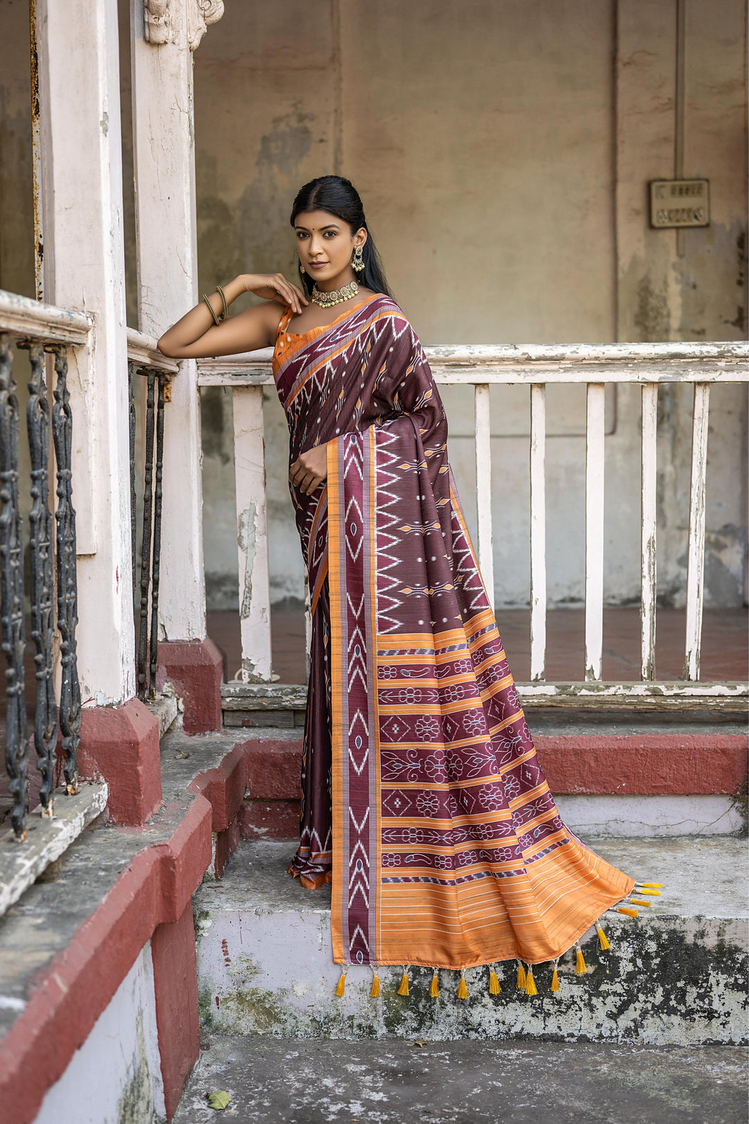 Traditional Tussar saree with Ikkat print and temple border for family events