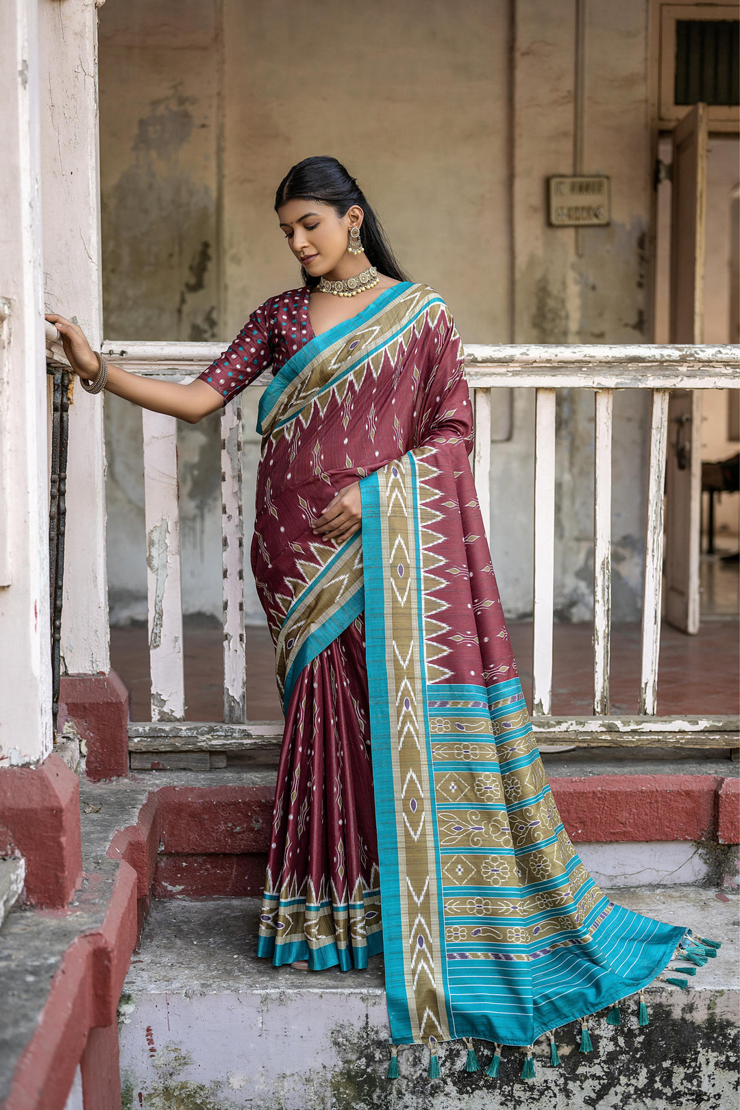 Traditional silk saree with temple border and intricate Ikkat pattern