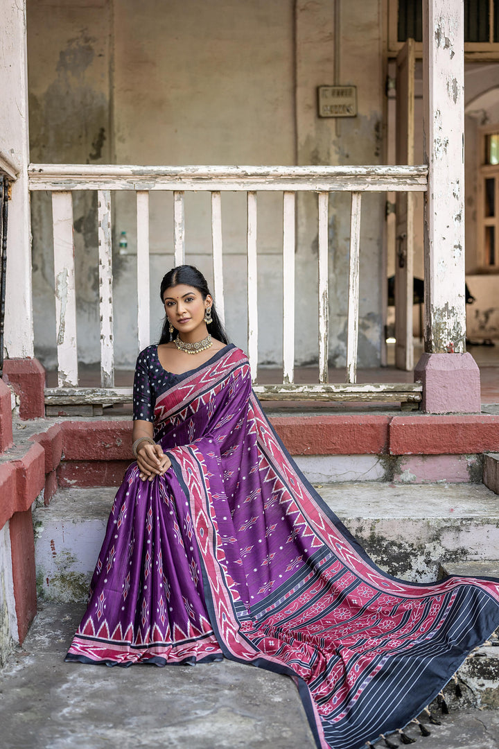 Tussar silk saree with traditional temple border, Ikkat print, and contrast blouse for special occasions