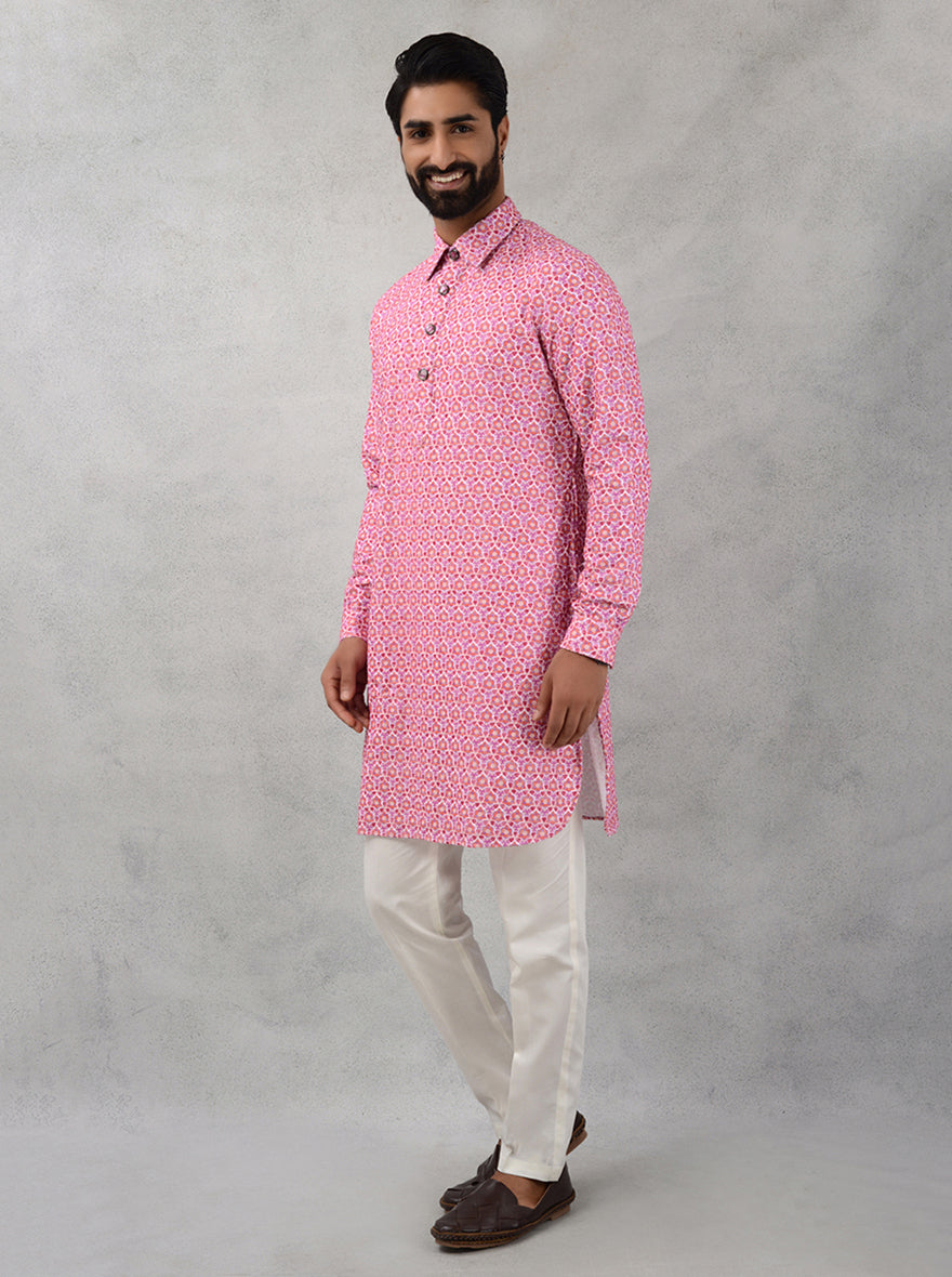 Elegant pink kurta pajama designed for modern men, perfect for showcasing your style at cultural celebrations.