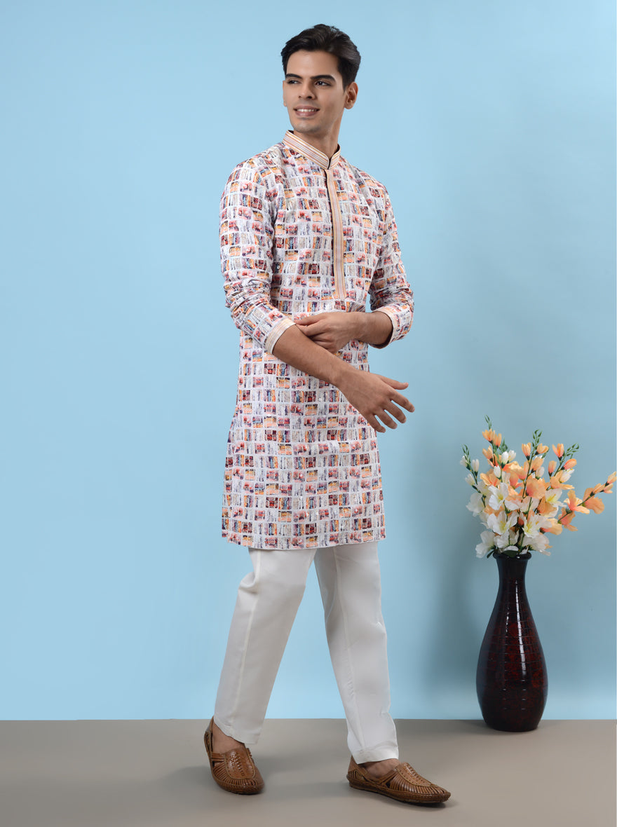 Unique white & red kurta pajama featuring intricate sequins work, perfect for enhancing your festive appearance.