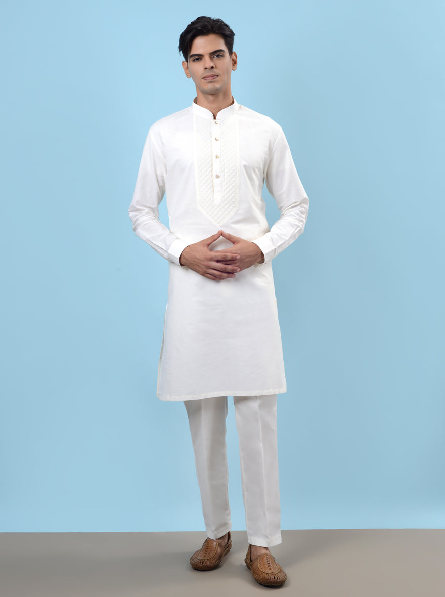 Celebrate in style with our off-white cotton kurta pajama, ideal for traditional gatherings in the USA.