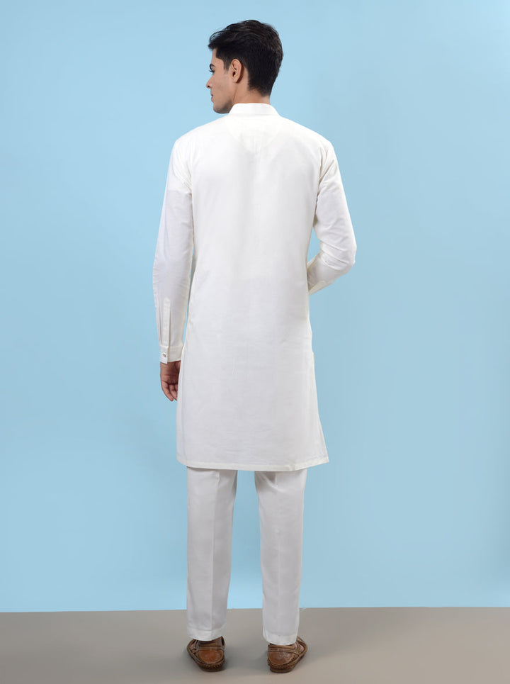 Off-white cotton kurta pajama for men, combining comfort and elegance for festive events.