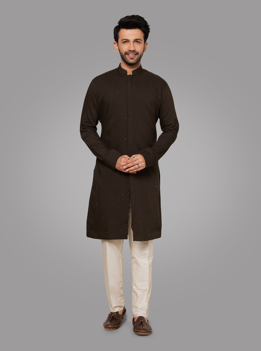 Deep Green Kurta Pajama set for men with traditional embroidery for festive wear.