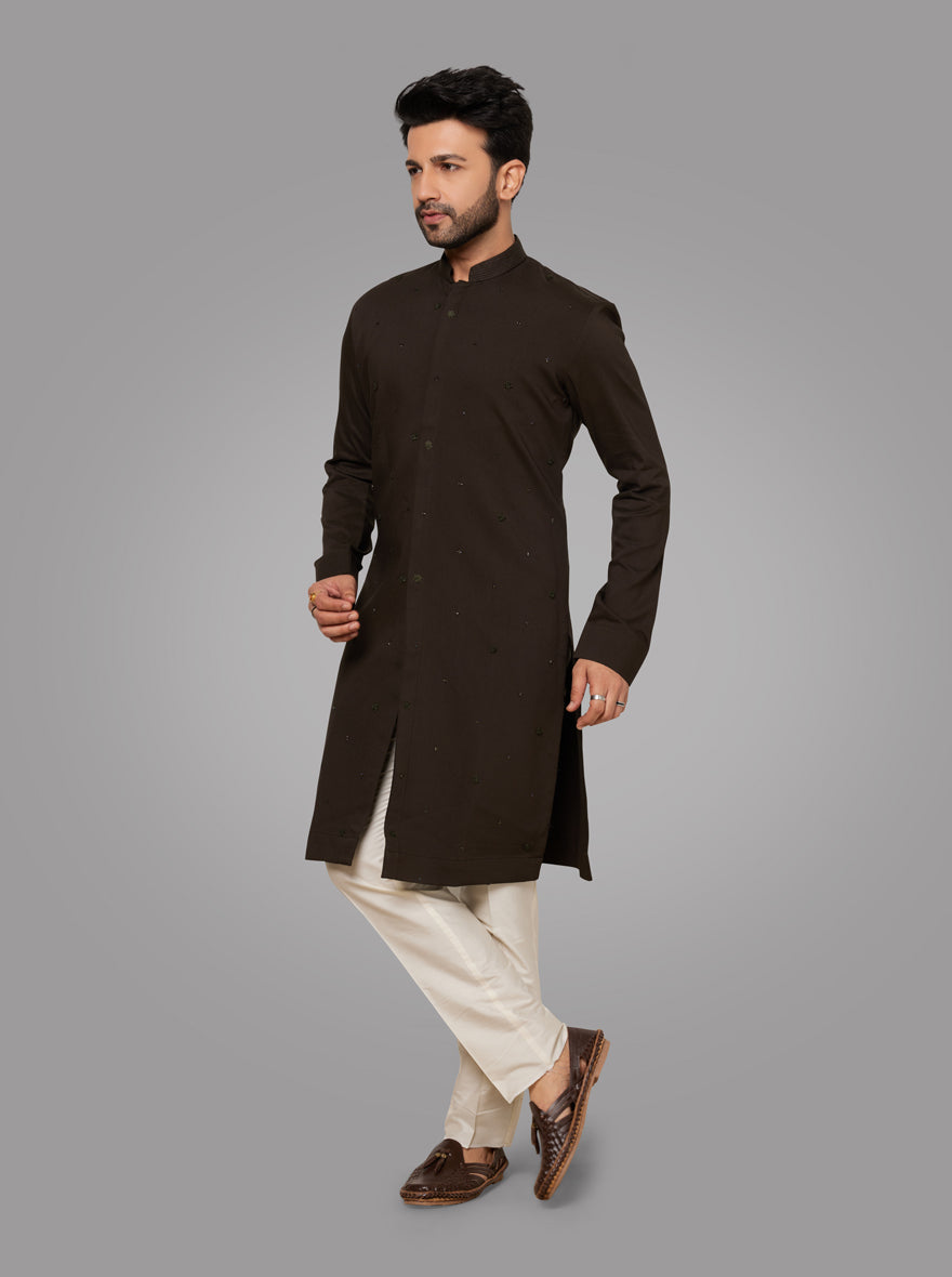 Unique dark green kurta pyjama made from terry rayon with embroidery, elevating your traditional look for celebrations.