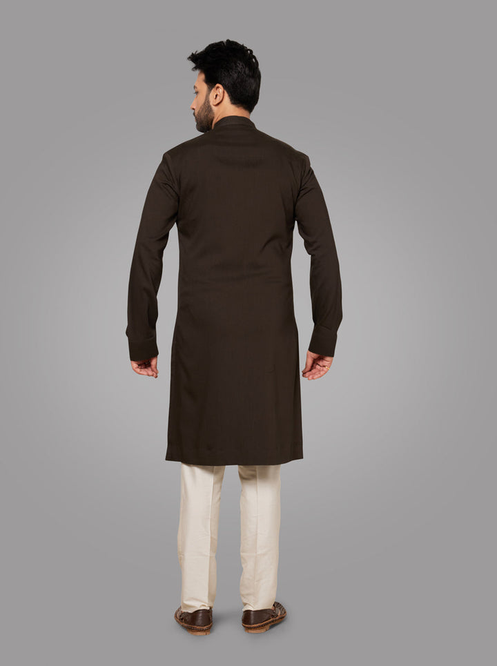 Men’s Deep Green Kurta Pajama with embroidered design, perfect for Indian festivals.