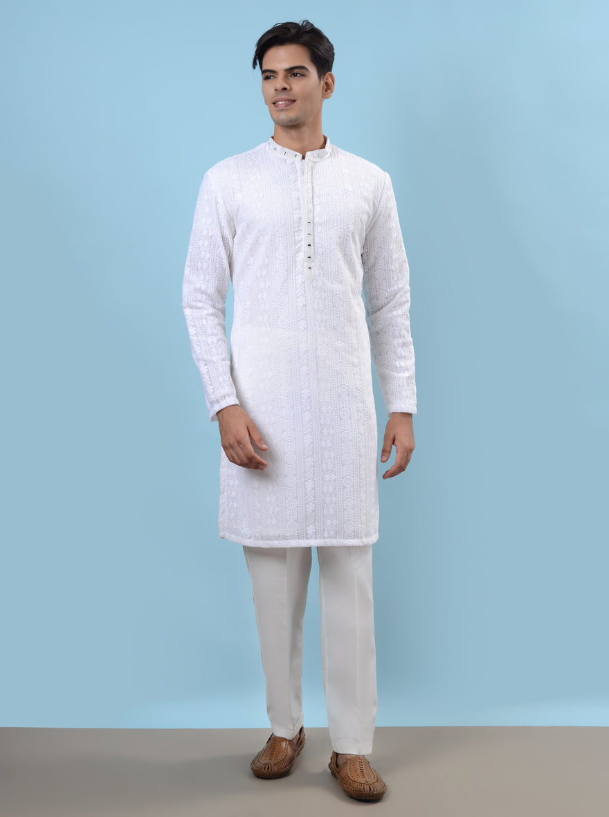 Celebrate in style with our white silk kurta pajama, designed for men who value elegance.