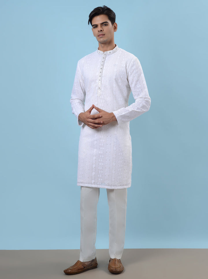 Luxurious white silk kurta pajama, perfect for making an impression at gatherings in the USA.