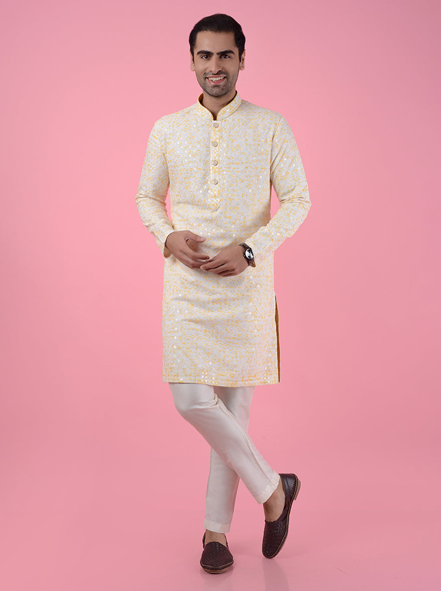 Designer cream and yellow kurta pajama set, perfect for men embracing tradition at special occasions across the USA.