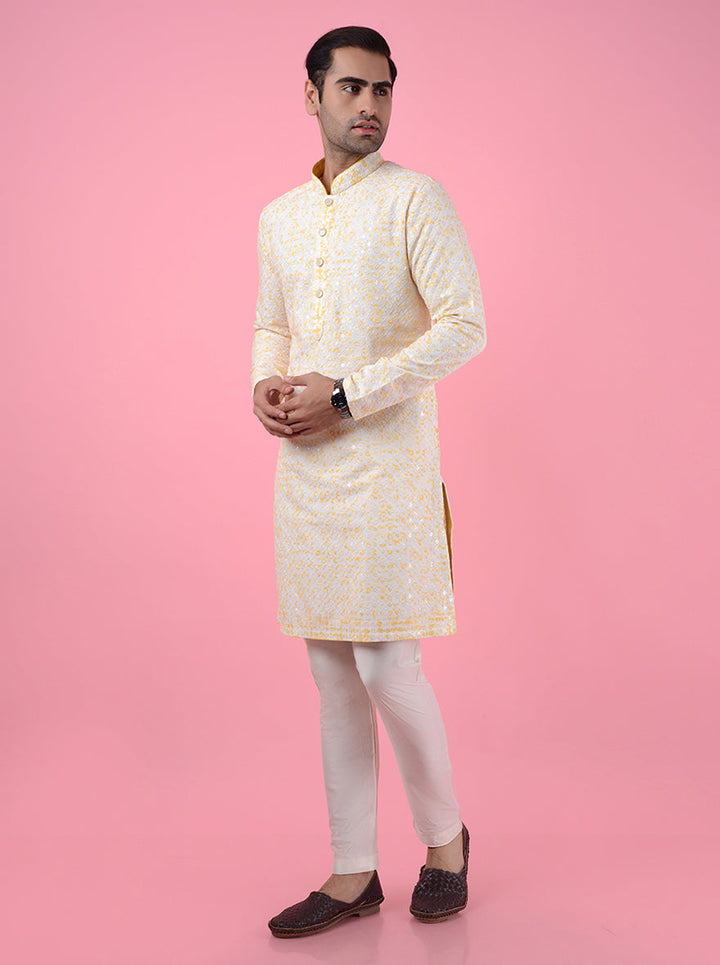 Luxurious cream and yellow kurta pajama, combining silk and tradition, ideal for festive events in the USA.