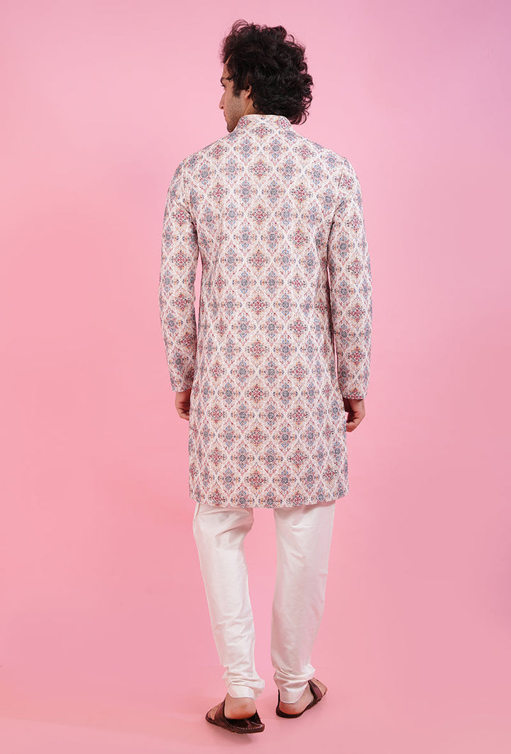 Elevate your wardrobe with this cream kurta pajama set for celebrations.