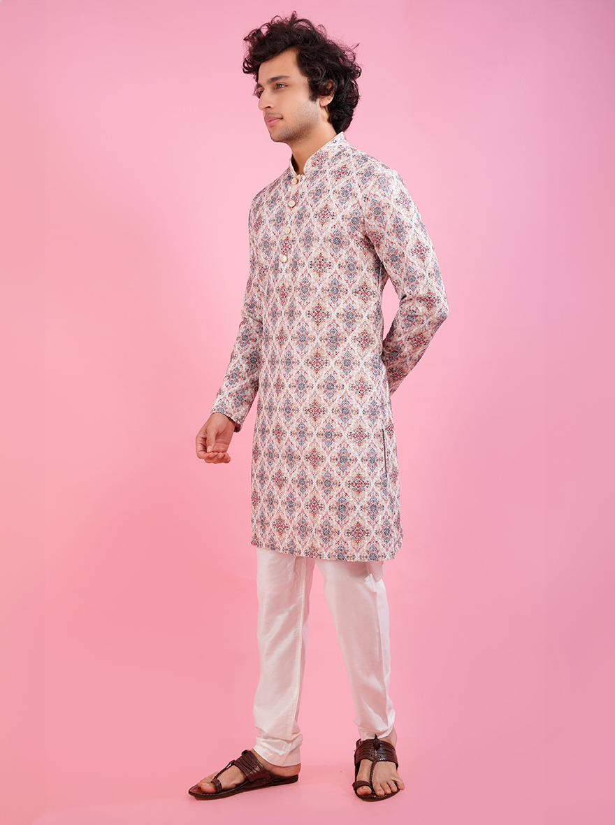 Make a statement in this sophisticated cream kurta pajama set.