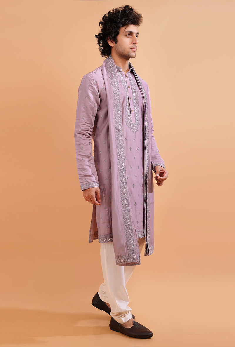 Premium onion pink kurta pajama set for men, crafted with silk blend for traditional elegance.