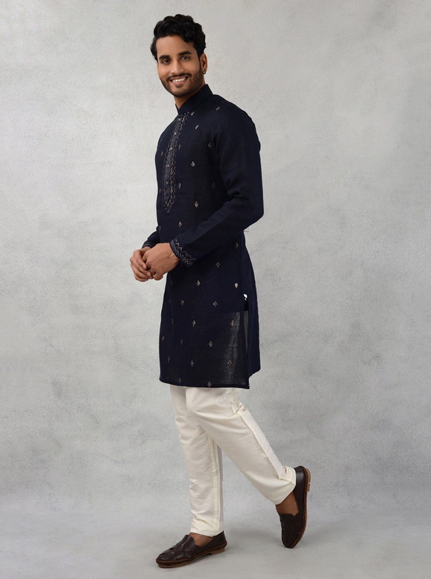 Discover elegance with this navy linen kurta pajama, designed for making a statement at any event in the USA.