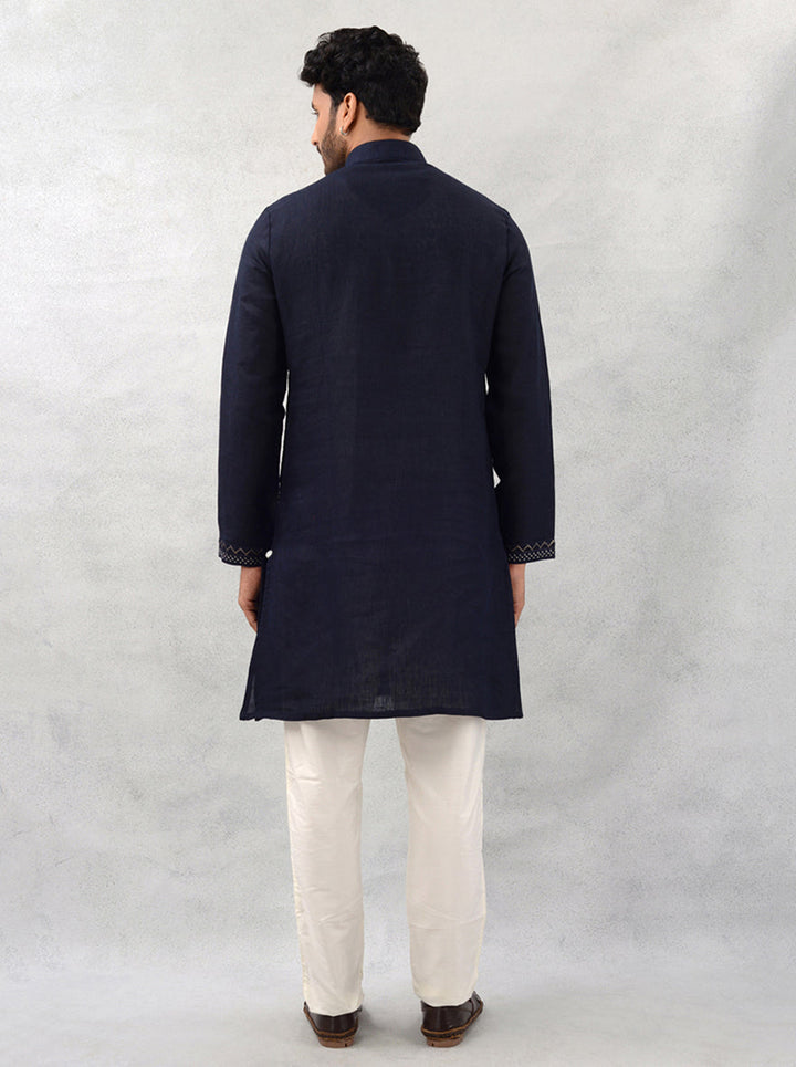 Celebrate in style with our navy blue kurta pajama, combining intricate embroidery and comfort for festive occasions.