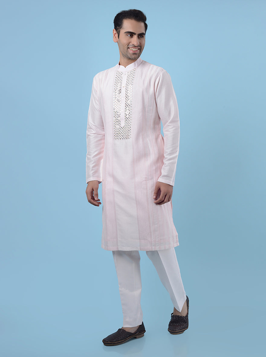 Men's pink kurta pajama, made from Chanderi silk with beautiful mirror embroidery for cultural events.