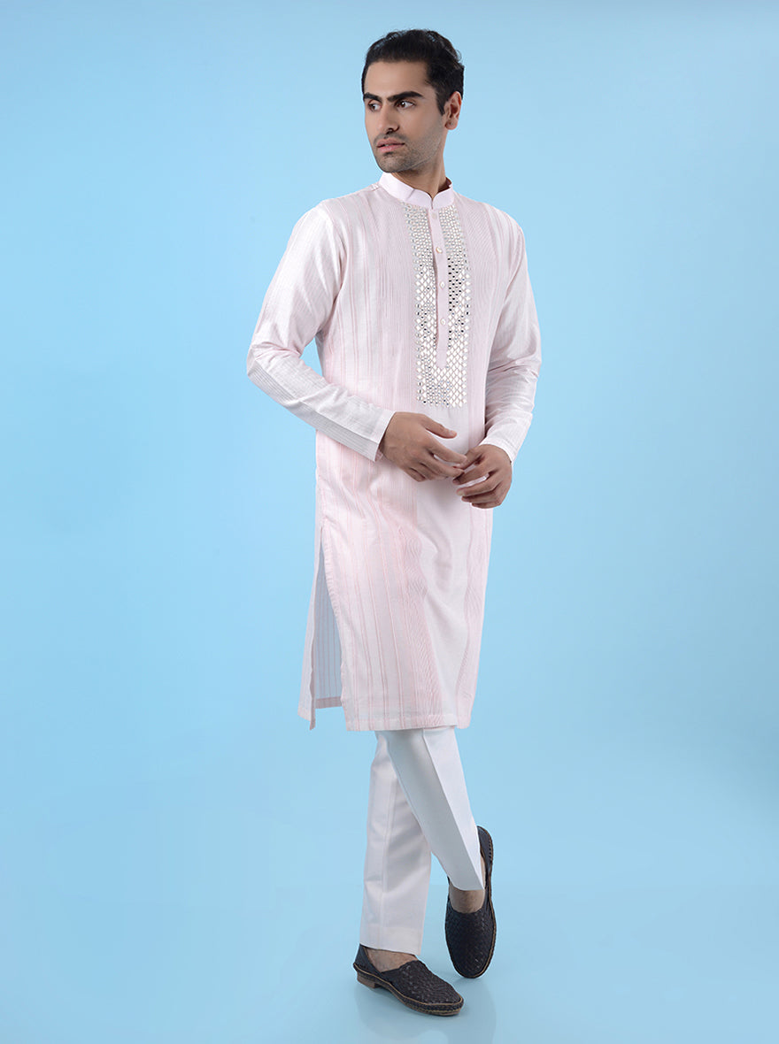 Men's pink kurta pajama set in Chanderi silk with intricate mirror embroidery, ideal for weddings.