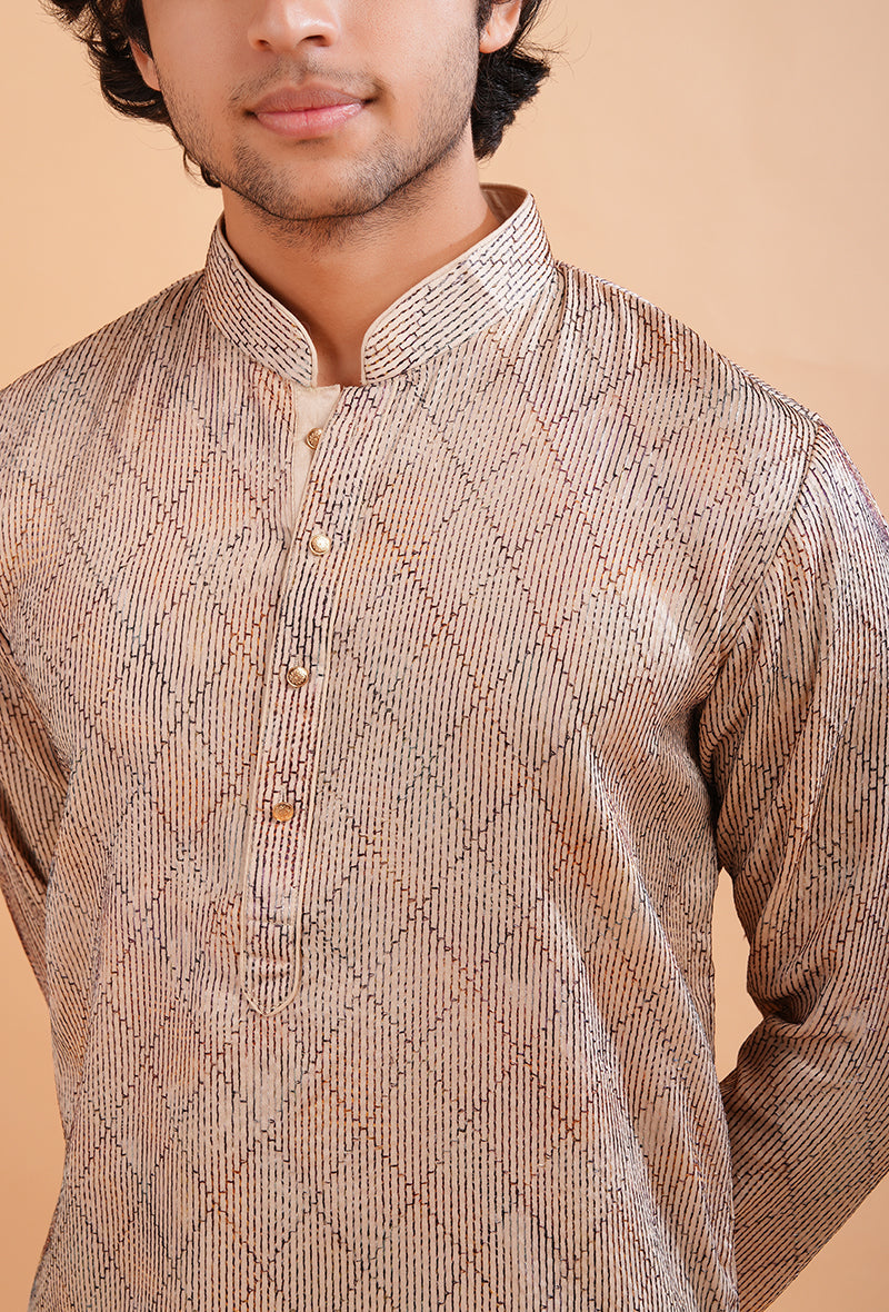 Cream silk blend men's kurta pajama set with fine embroidery for elegant traditional wear.